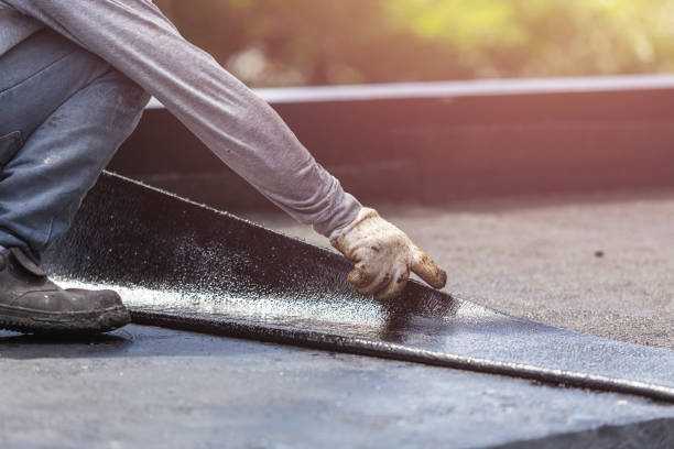 Professional Emergency Waterproofing technician working in Whitehall, WI